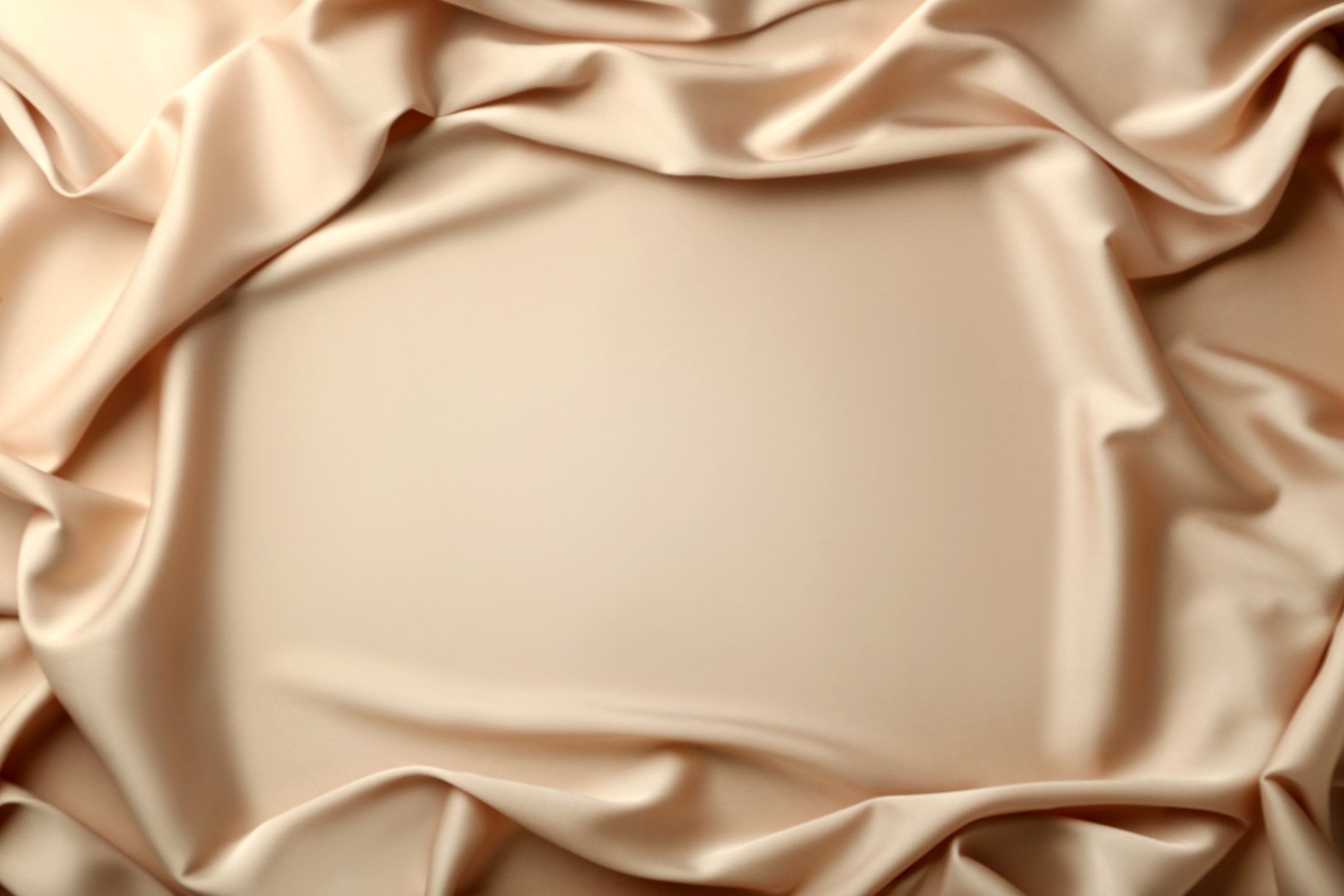 Background of beige satin fabric